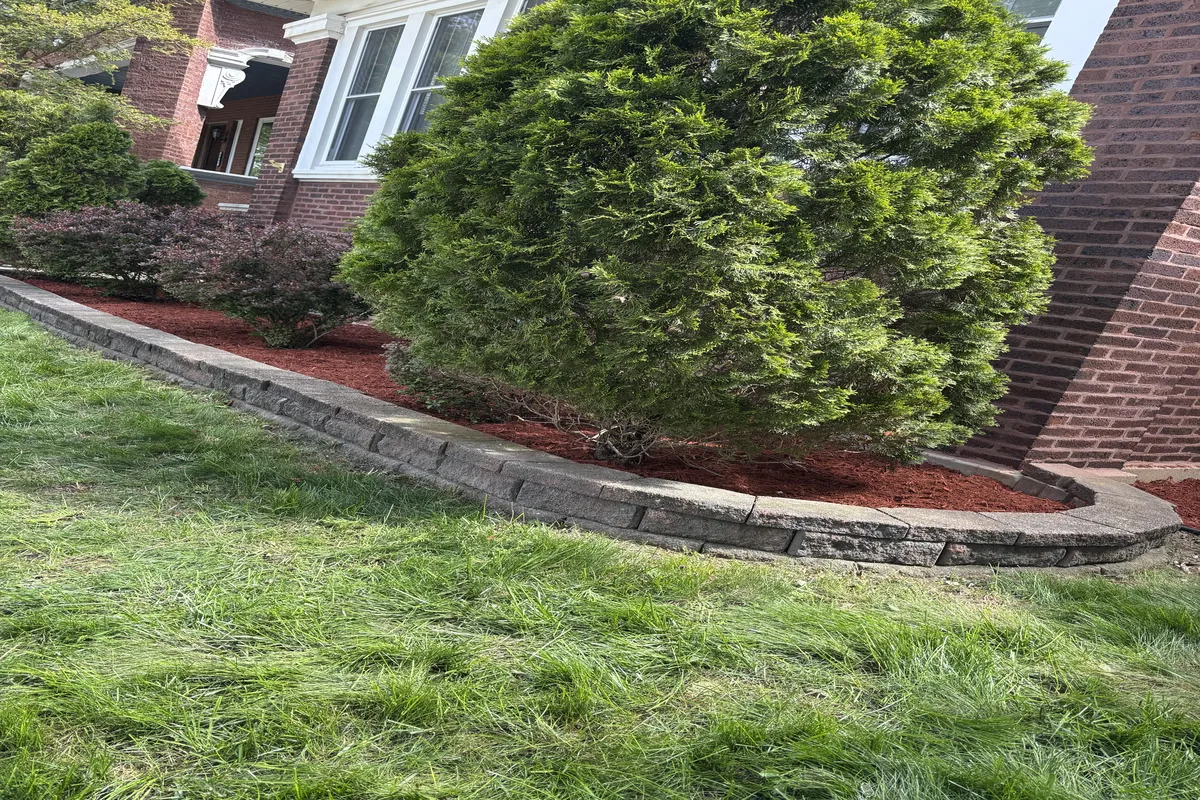 Retaining wall with a bush addition